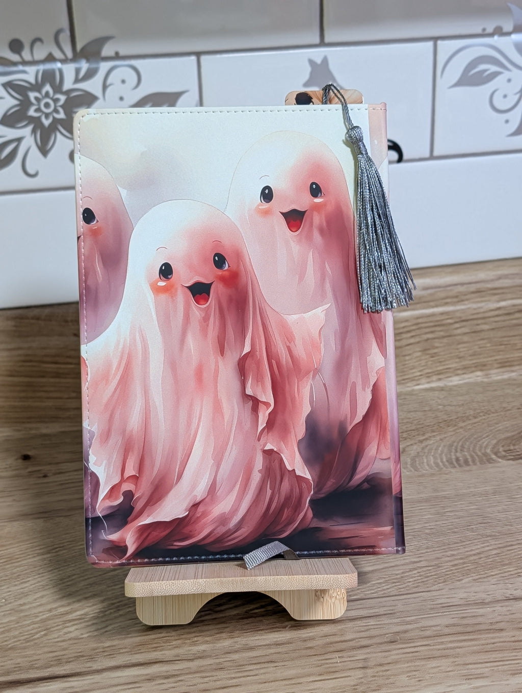 Cute ghost notebook side view with silver tassel bookmark