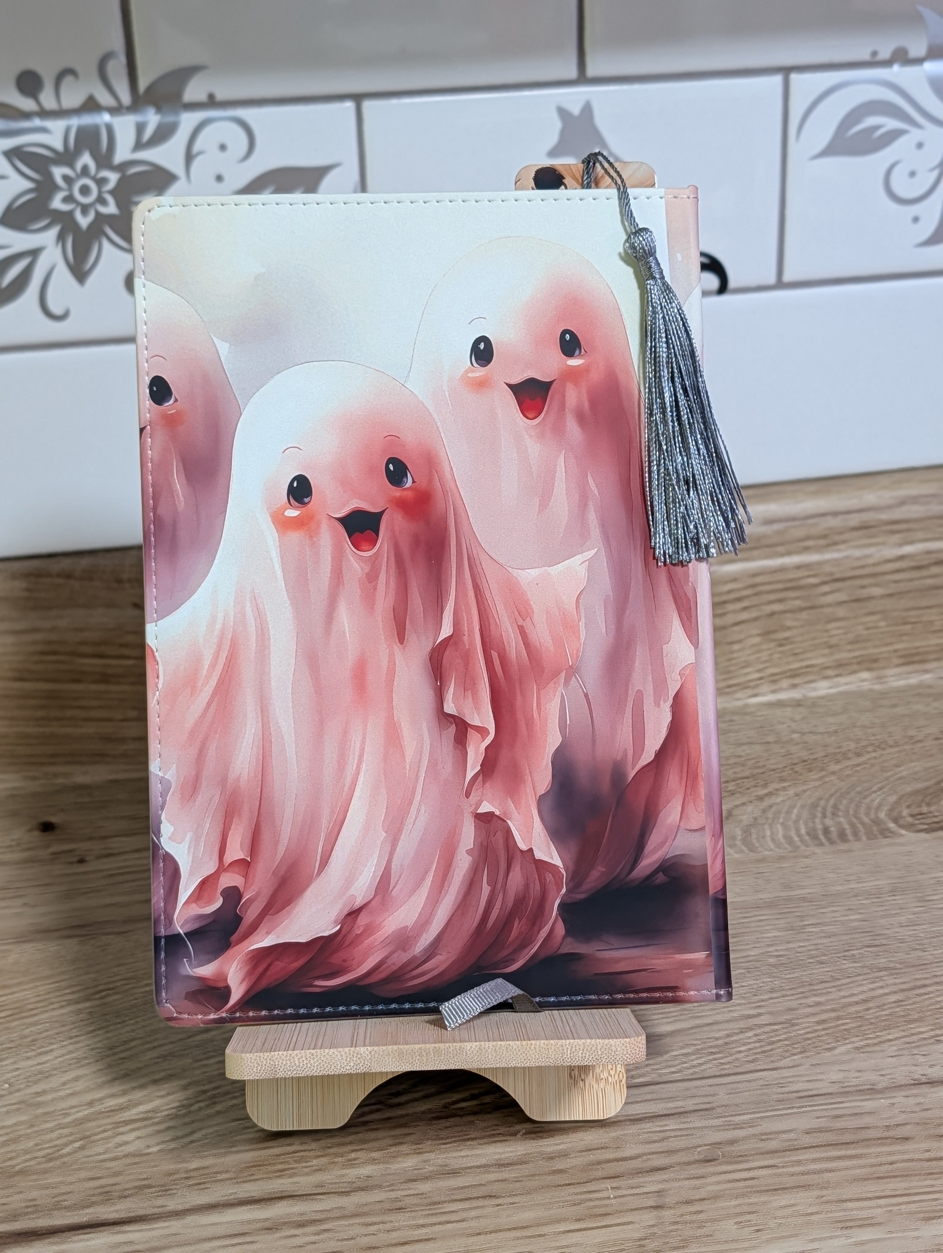 Cute ghost notebook side view with silver tassel bookmark