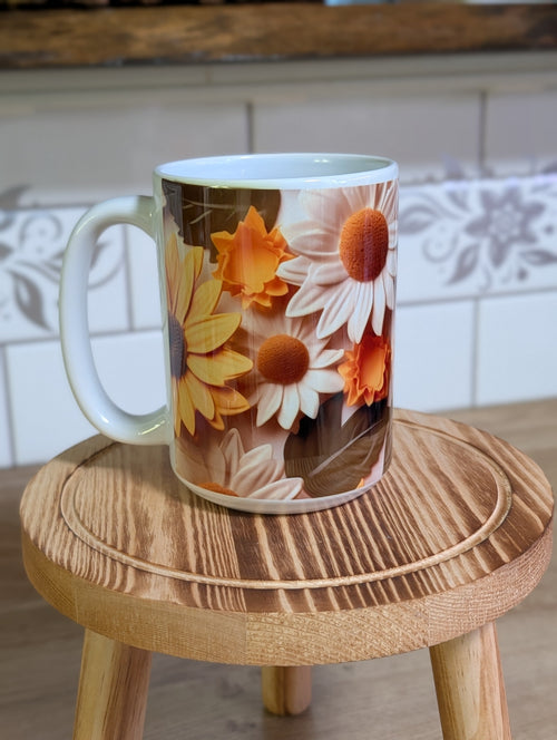 3D sunflower and daisy ceramic mug side view on wooden stool showing full wrap floral design