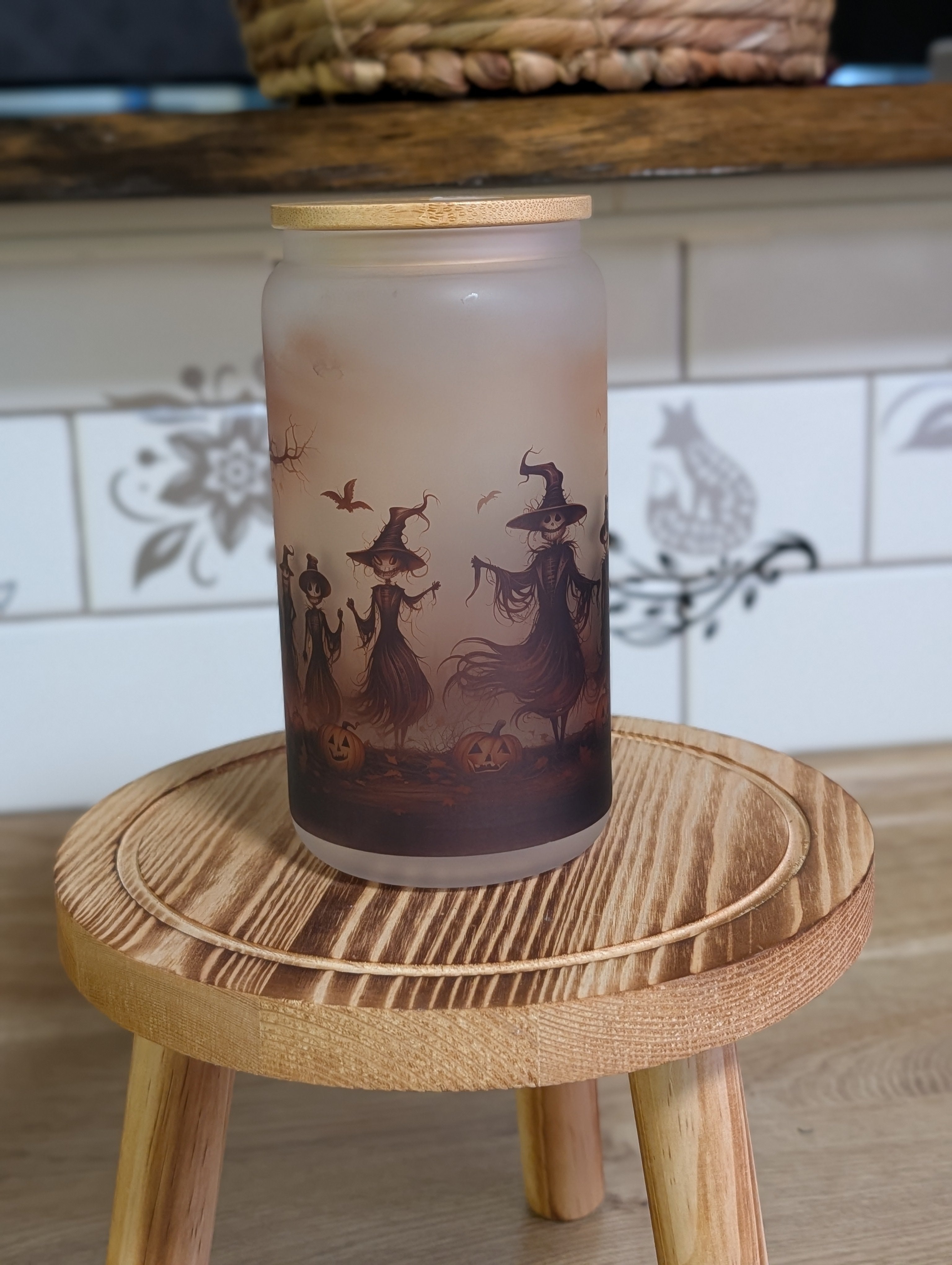 Halloween scarecrow witches frosted glass can side view showing full wrap scene with dead tree and bats