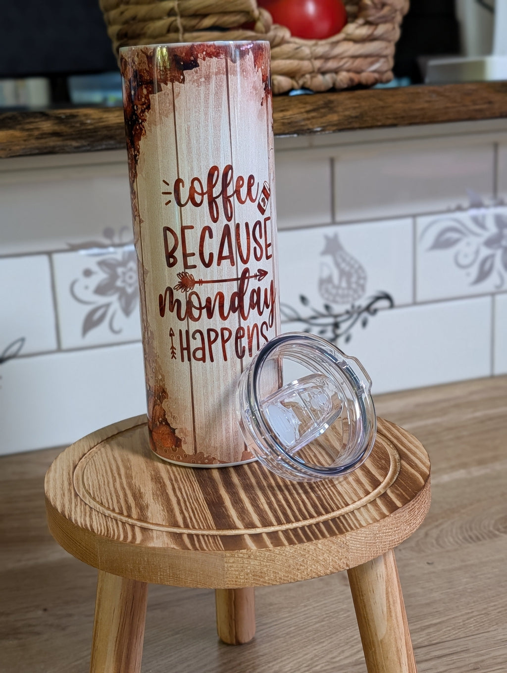 Coffee Because Monday Happens tumbler front view with rustic wood design