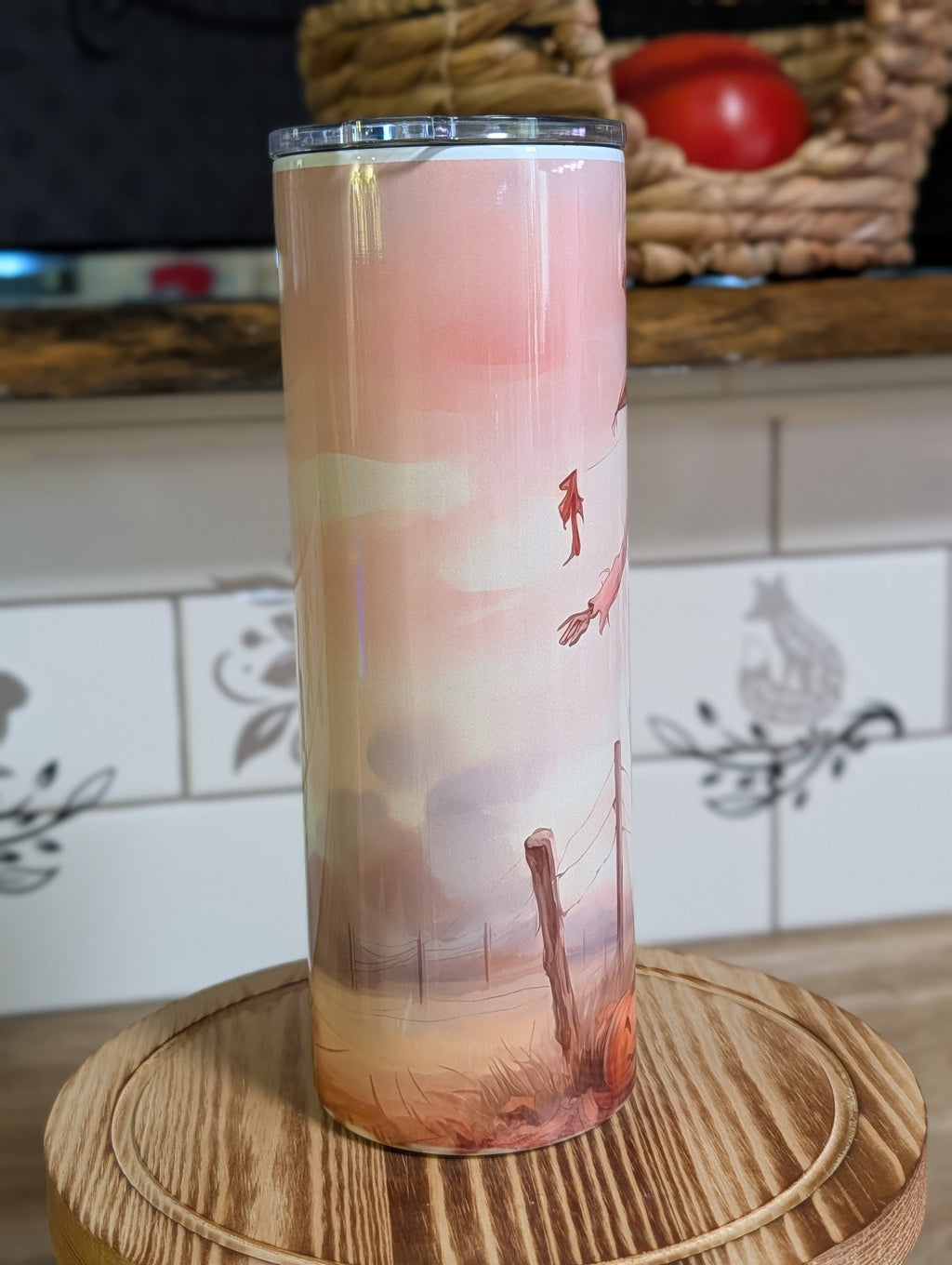 Watercolor scarecrow tumbler reverse side close up with autumn leaves and fence detail
