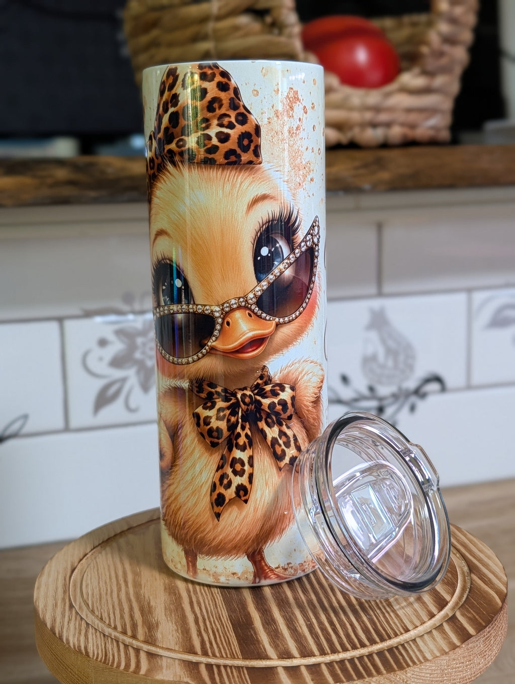 Glamour duck tumbler front view with lid off showing rhinestone sunglasses and leopard bow design