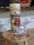 Happiness Is a Cup of Coffee and a Good Book tumbler with lid and straw on wooden stool