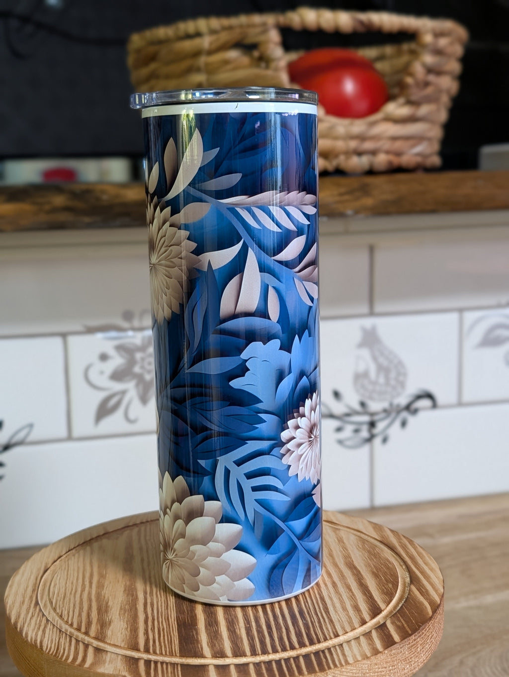 3D navy blue floral peony tumbler side view with lid on showing tropical leaf pattern