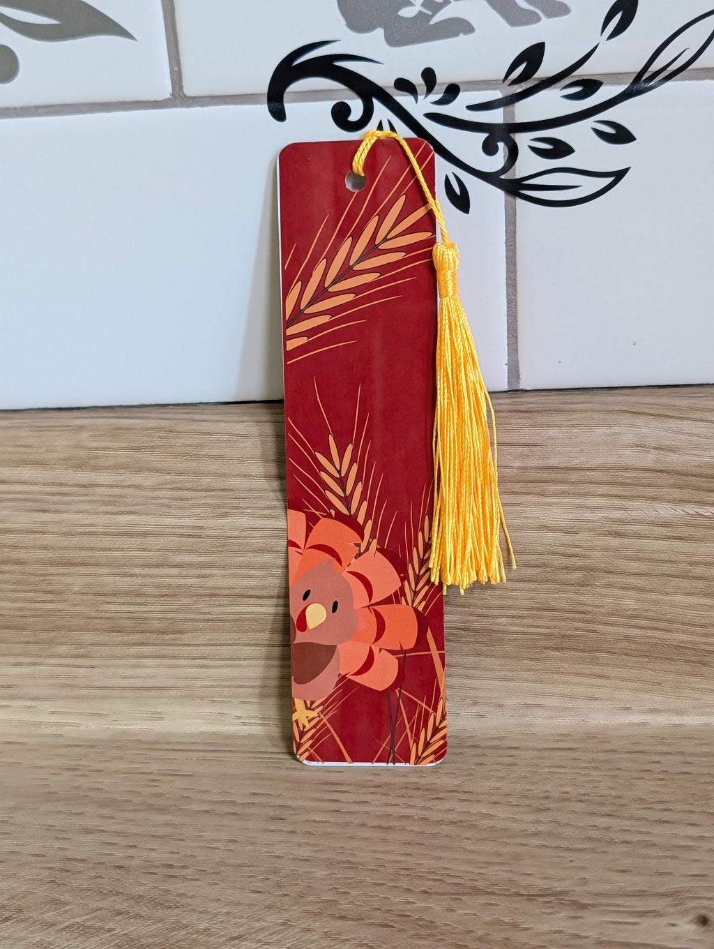 Thanksgiving wheat bookmark back - crimson background with golden wheat and turkey illustration with gold tassel