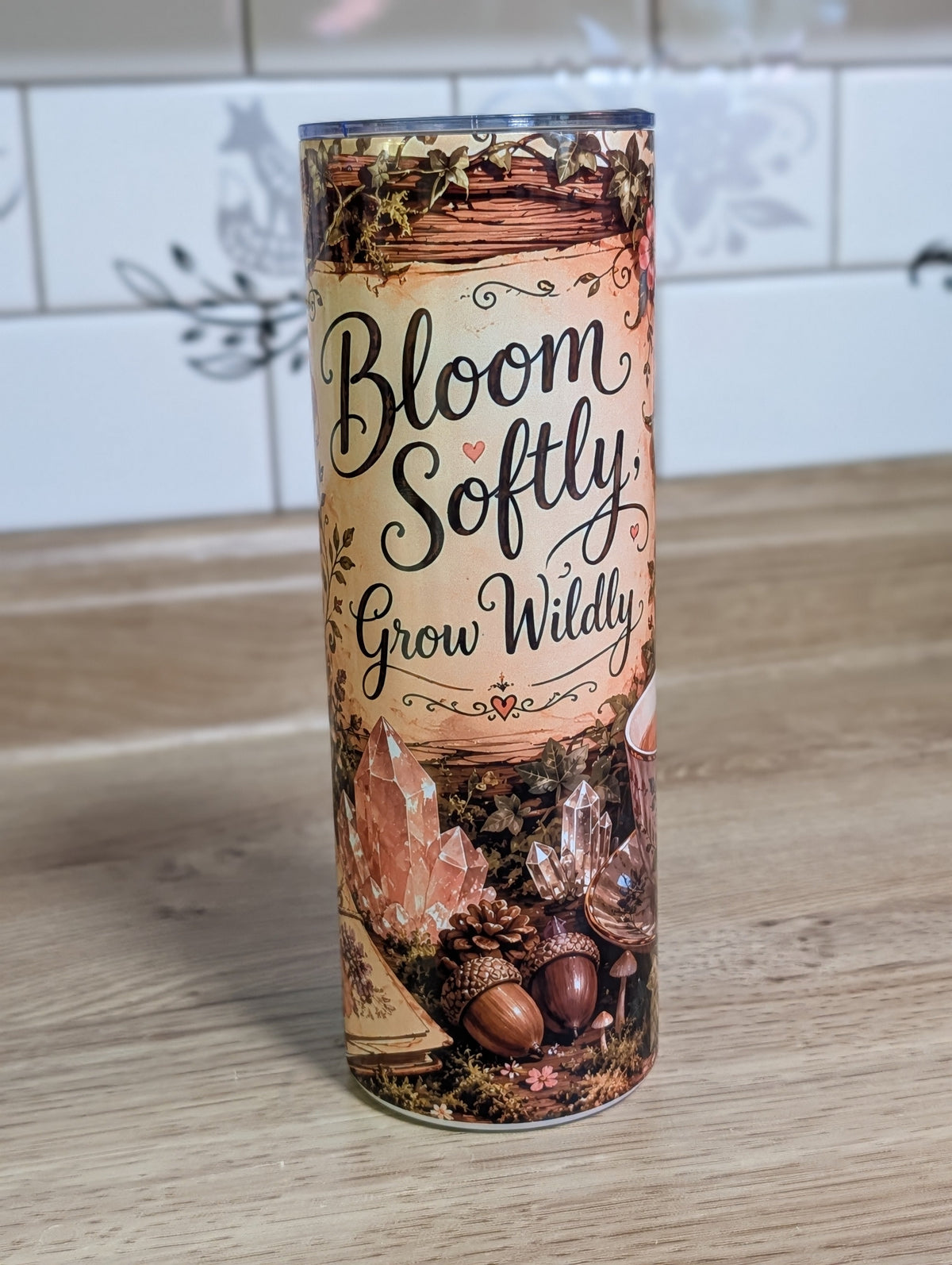 Bloom Softly Grow Wildly text side with crystal clusters and acorns