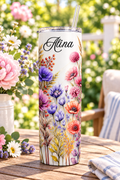 Wildflower Sunset tumbler with sample name Alina in garden setting