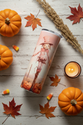 Halloween Scarecrow Tumbler spooky chic flat lay with mini pumpkins, dried corn stalks, red maple leaves and amber votive candle
