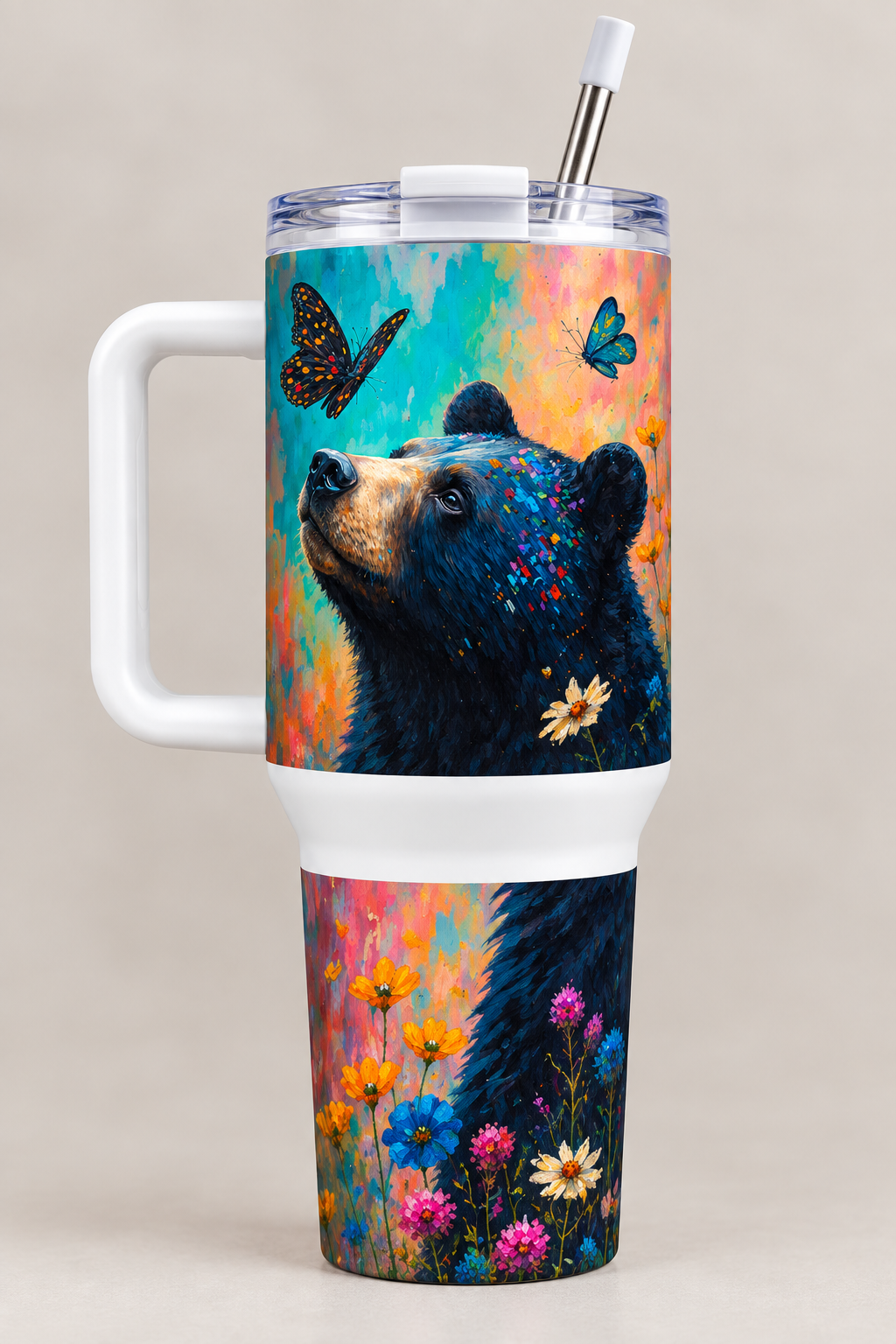 40oz tumbler with colorful black bear, butterflies and wildflowers