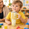 Toddler using the duck tumbler
